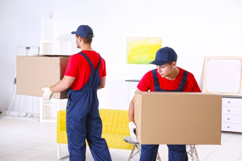 Removals team planning a move in a Marylebone street