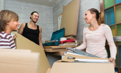 Packed moving boxes and furniture prepared for a local Marylebone relocation