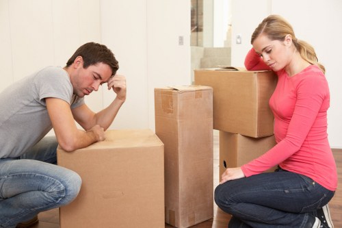 A moving team loading boxes and furniture for a Marylebone home relocation