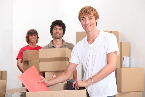 Furniture and office items being moved through a Marylebone building