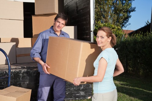 Furniture and moving boxes arranged for transport in a van